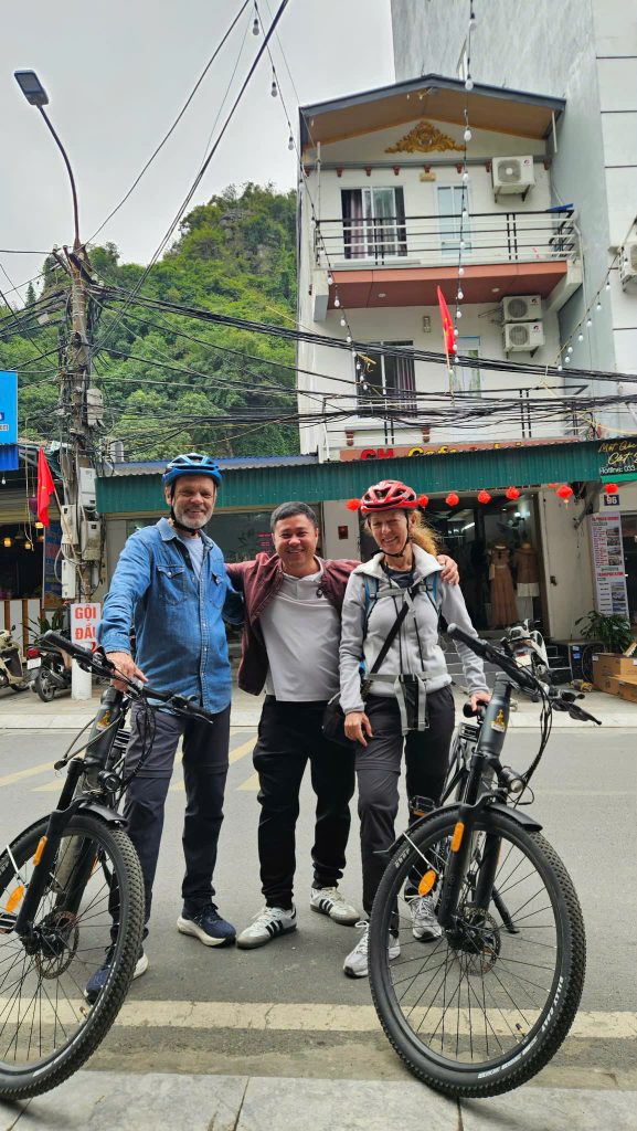 Senior travelers choosing E-Bike Rental Cat Ba for a safe and comfortable island experience