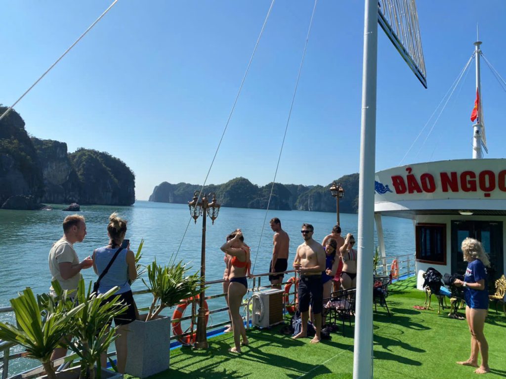 Guests enjoying the scenery at Ba Trai Dao Beach in Lan Ha Bay