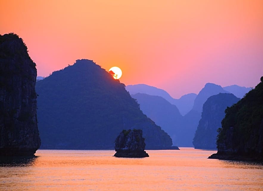 Sunset over Lan Ha Bay during a Cat Ba overnight cruise