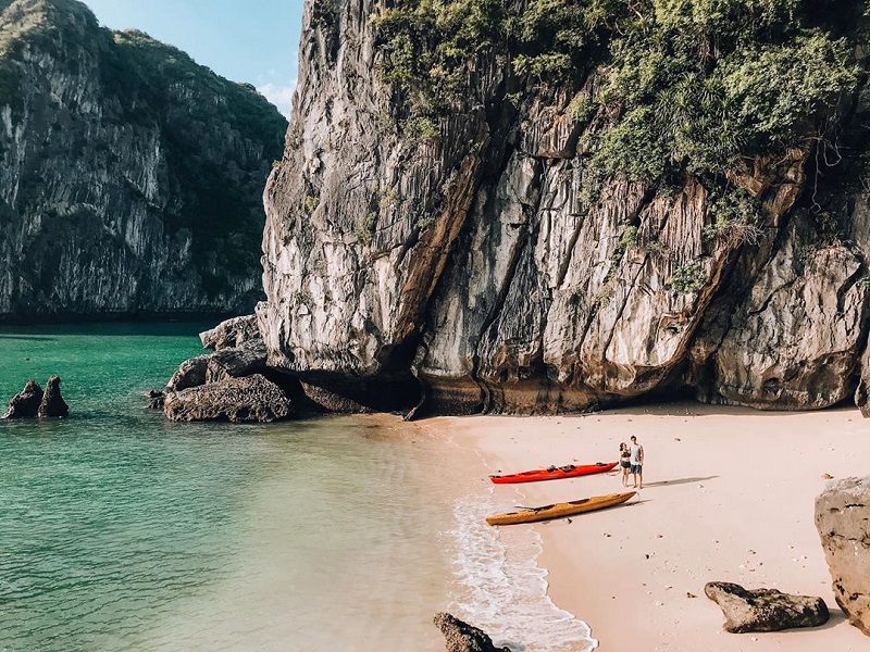Ba Trai Dao Beach in Lan Ha Bay surrounded by limestone islands
