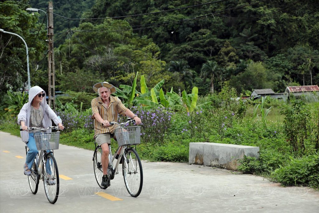 Cycling through Viet Hai Village on Cat Ba Island