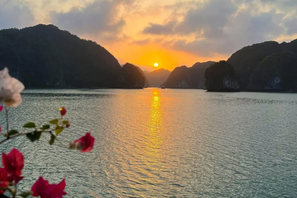 Sunset over Lan Ha Bay surrounded by limestone islands